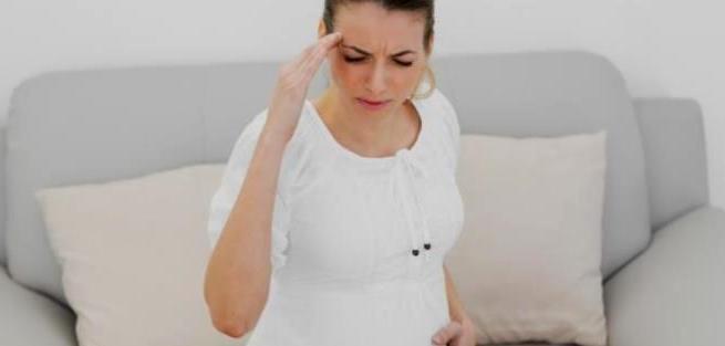 Головные боли во время беременности: причины и лечение