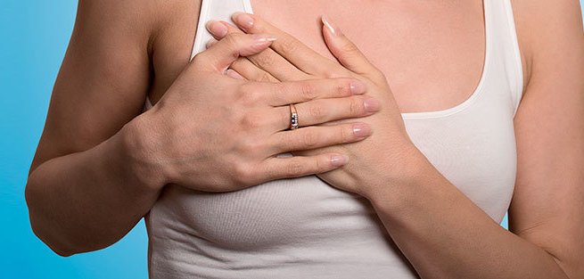 Месячные и боли в груди - симптом ПМС?